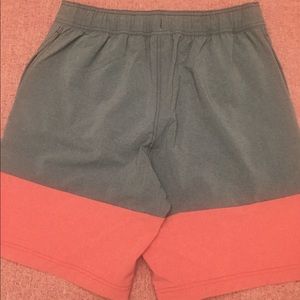 Men’s lined swim suit, blueish grey and red